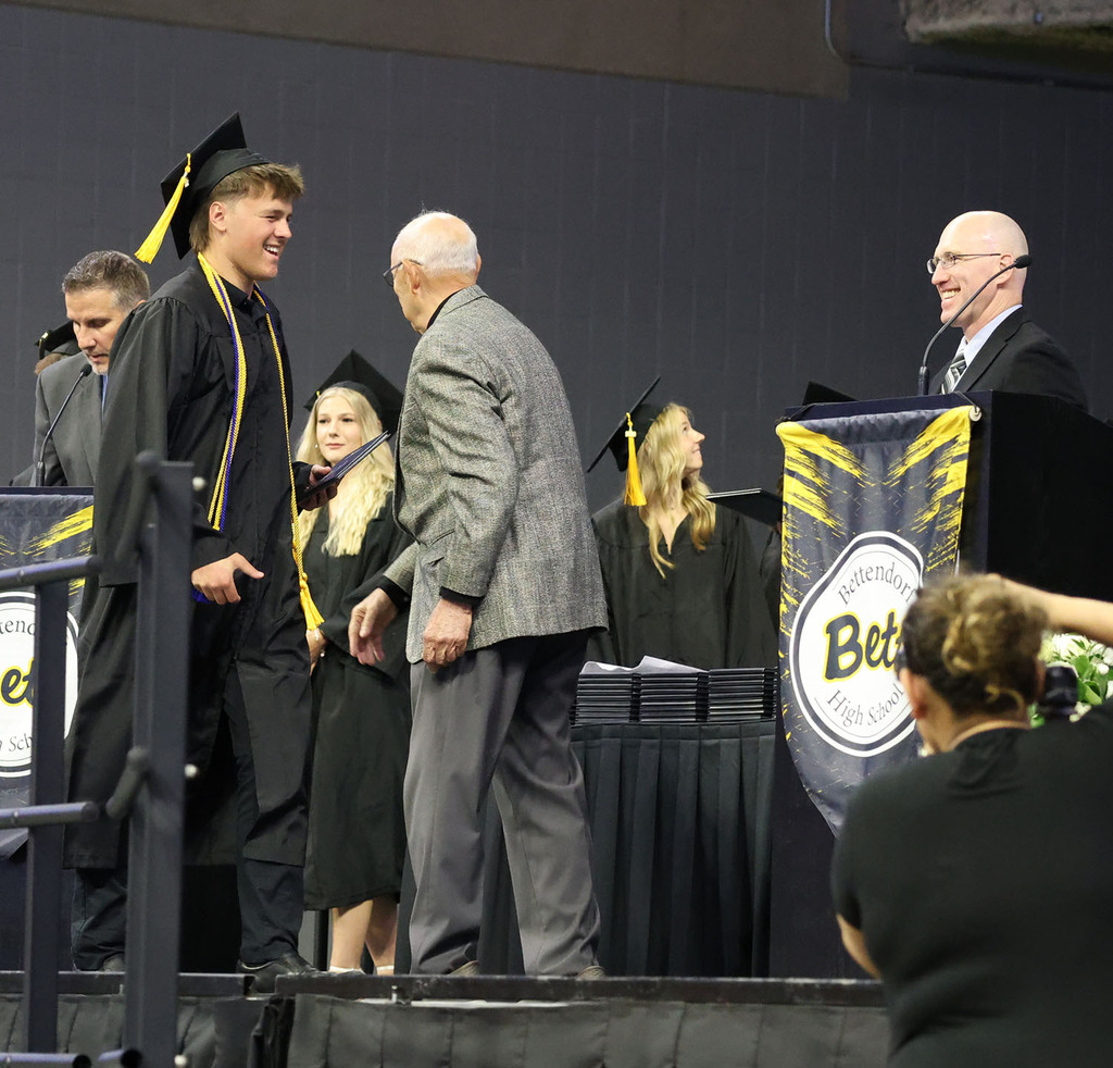 Student receiving his diploma