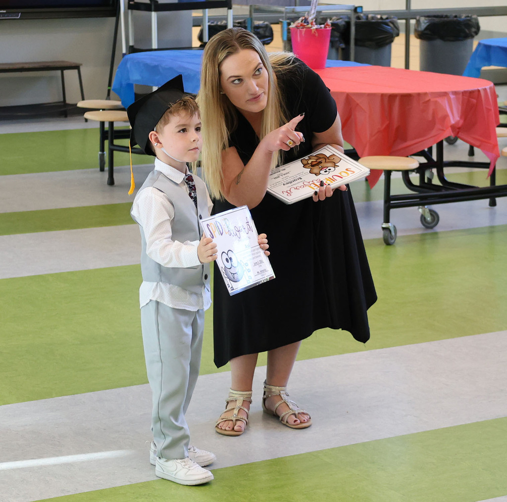 Student looking for his family with Miss Amanda