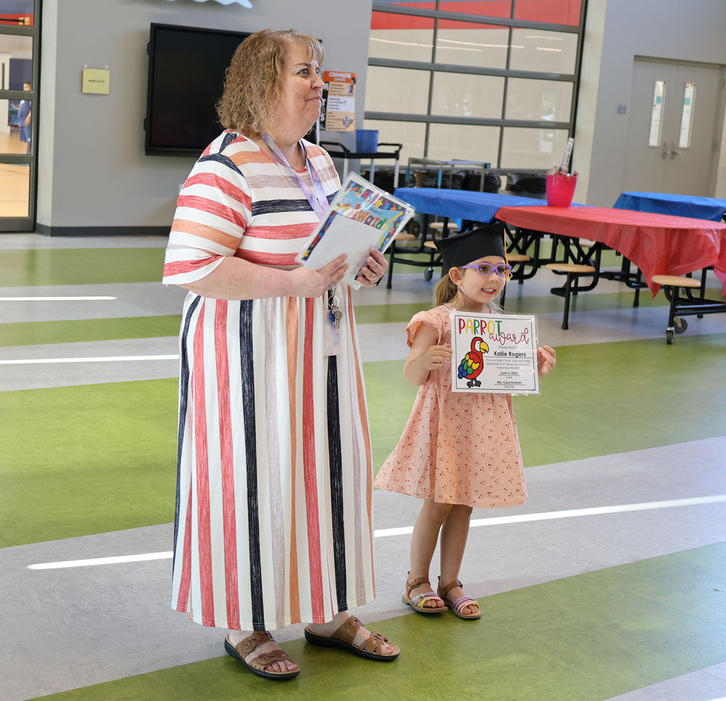 Proud student with Miss Cara
