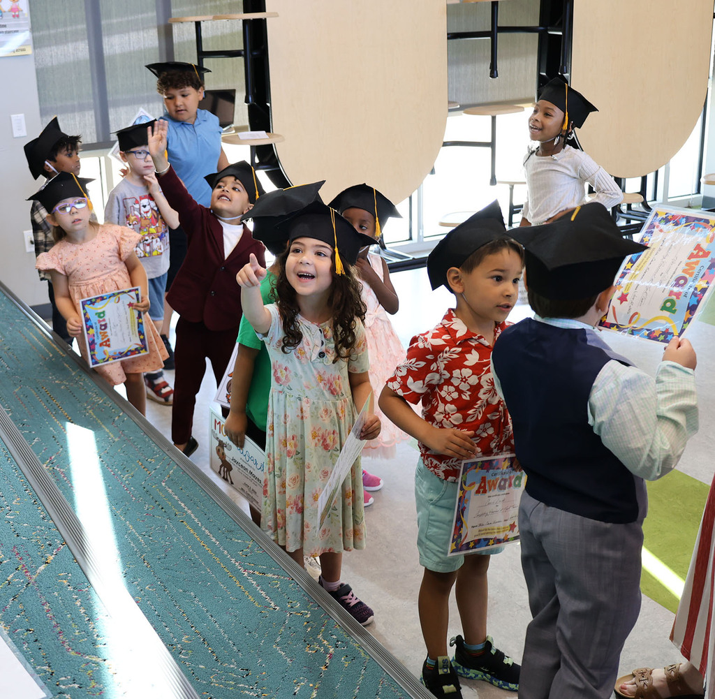Student graduates excited after the ceremony