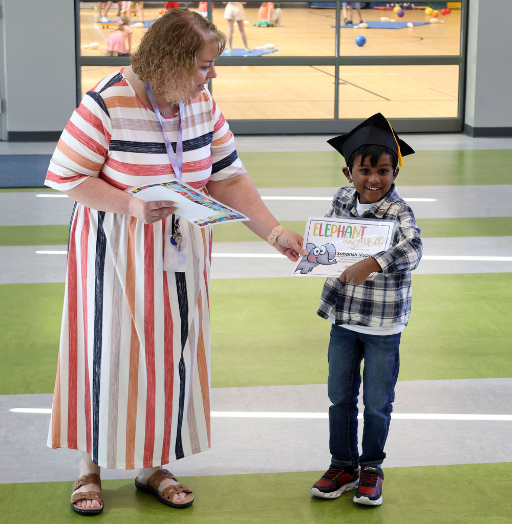 Proud student with Miss Cara
