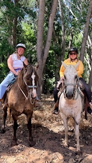 Abigail and her mom on horses