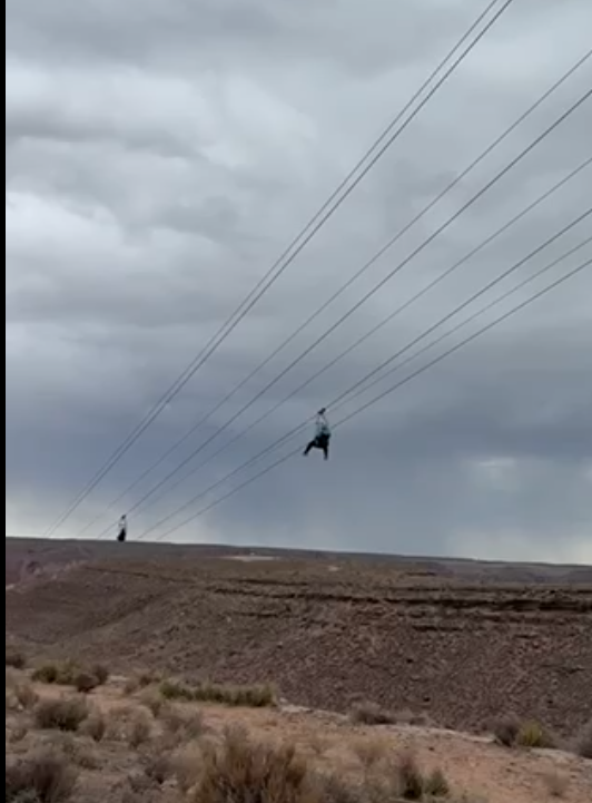 Abigail and her mom on the zip line