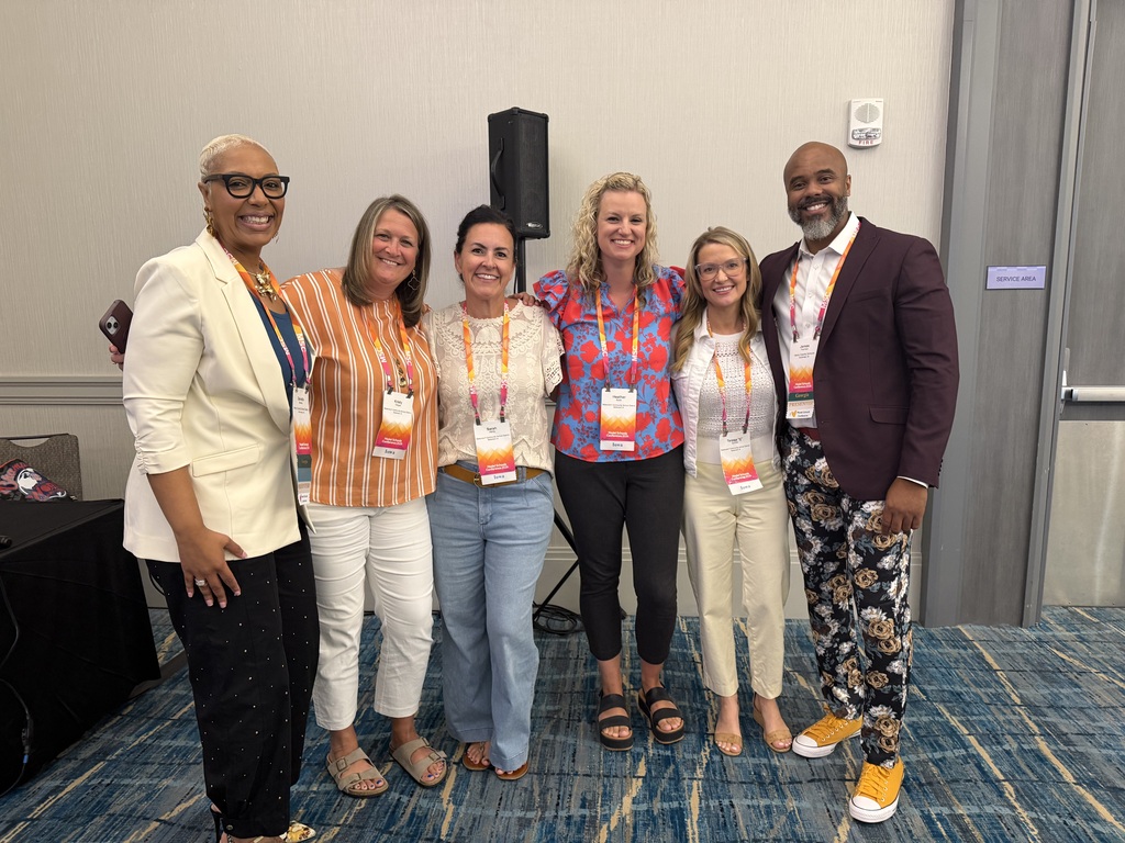Kristy Cleppe, Sarah Harris, Heather Budd, and TJ Grindle with presenters