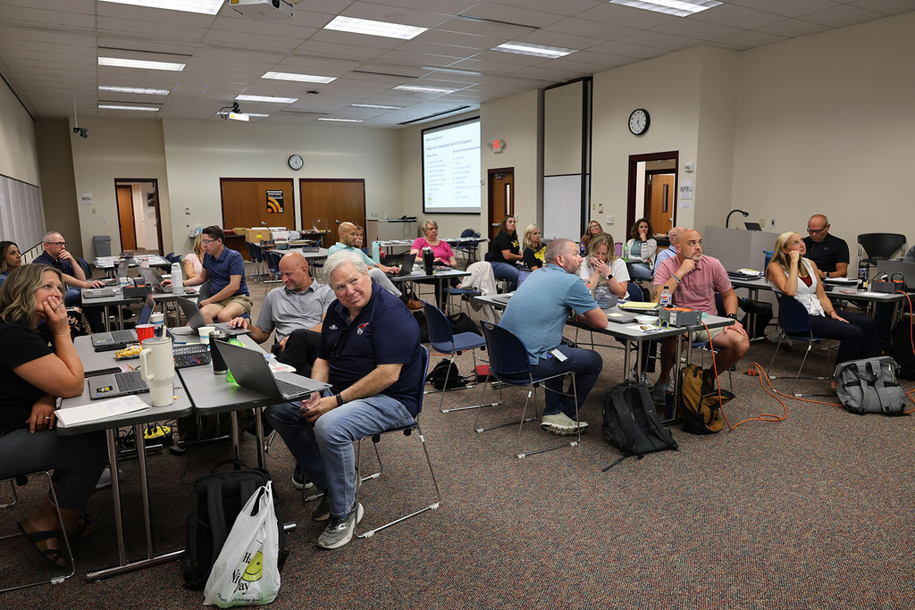 Administrators listening to one of the presentations