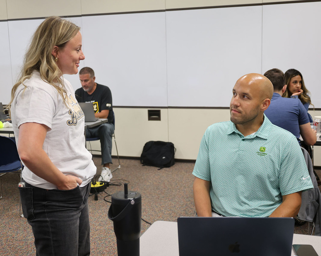 MS Dean - Emily Henneman visiting with HS Dean - Anthony Wittenmeyer