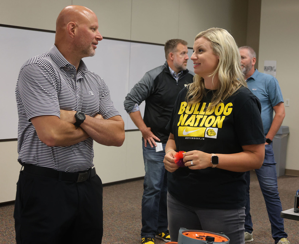 HS Activities Director - Zach Shay visiting with PN Principal - Heather Budd
