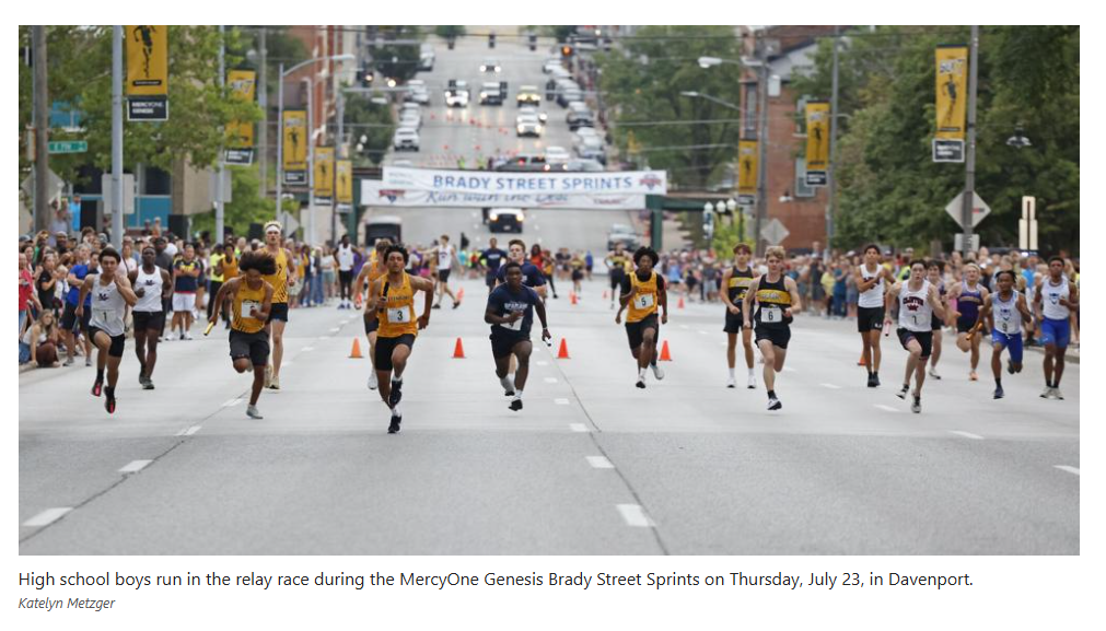 High school boys run in the relay race during the MercyOne Genesis Brady Street Sprints on Thursday, July 23, in Davenport. Katelyn Metzger