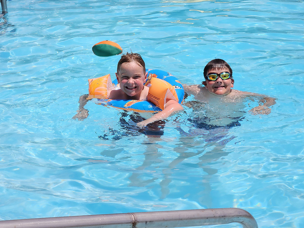 Nolan having fun in a swimming pool