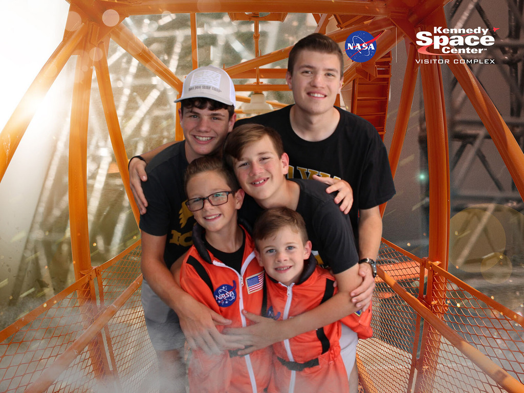 OGrady kids on the bridge to the shuttle.