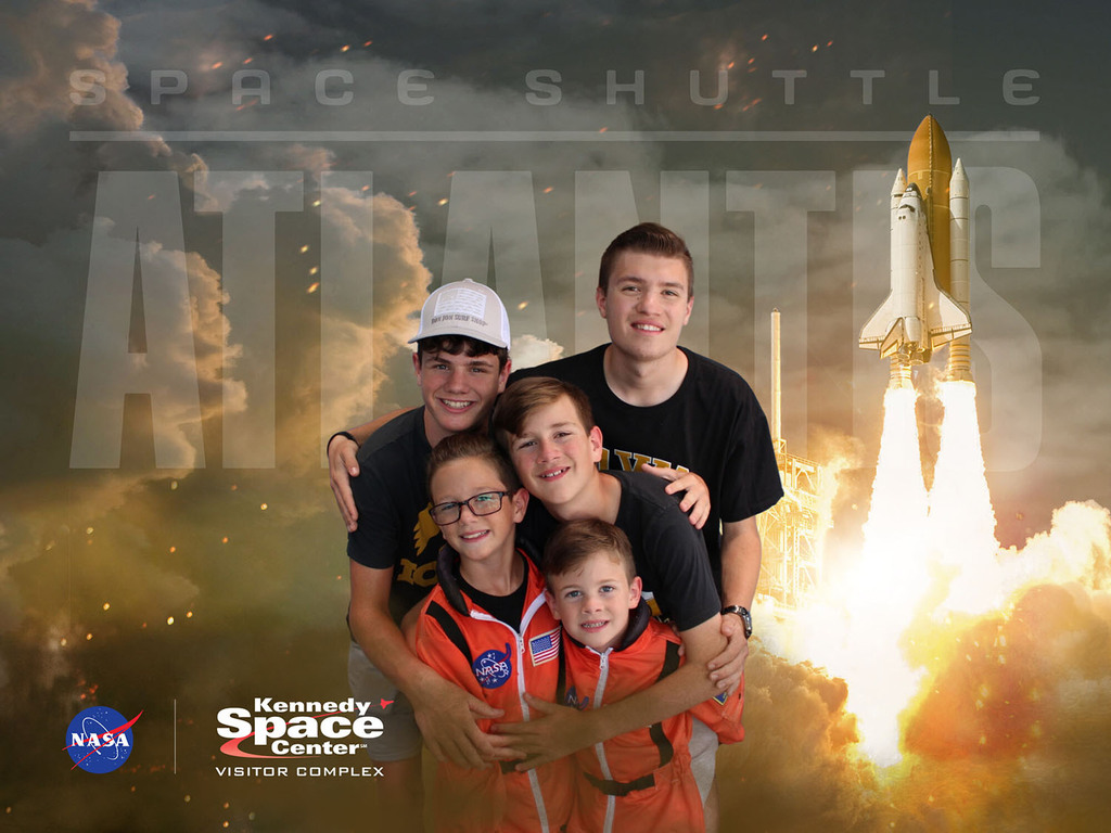 The OGrady kids with a space shuttle background