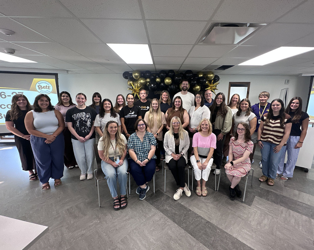 Our new teacher pose together for a picture