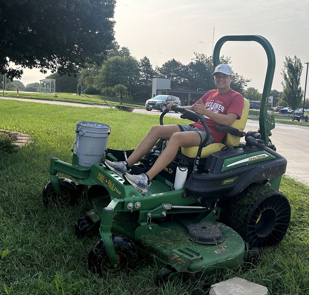 Ryan Hayden mowing the Edison Academy campus