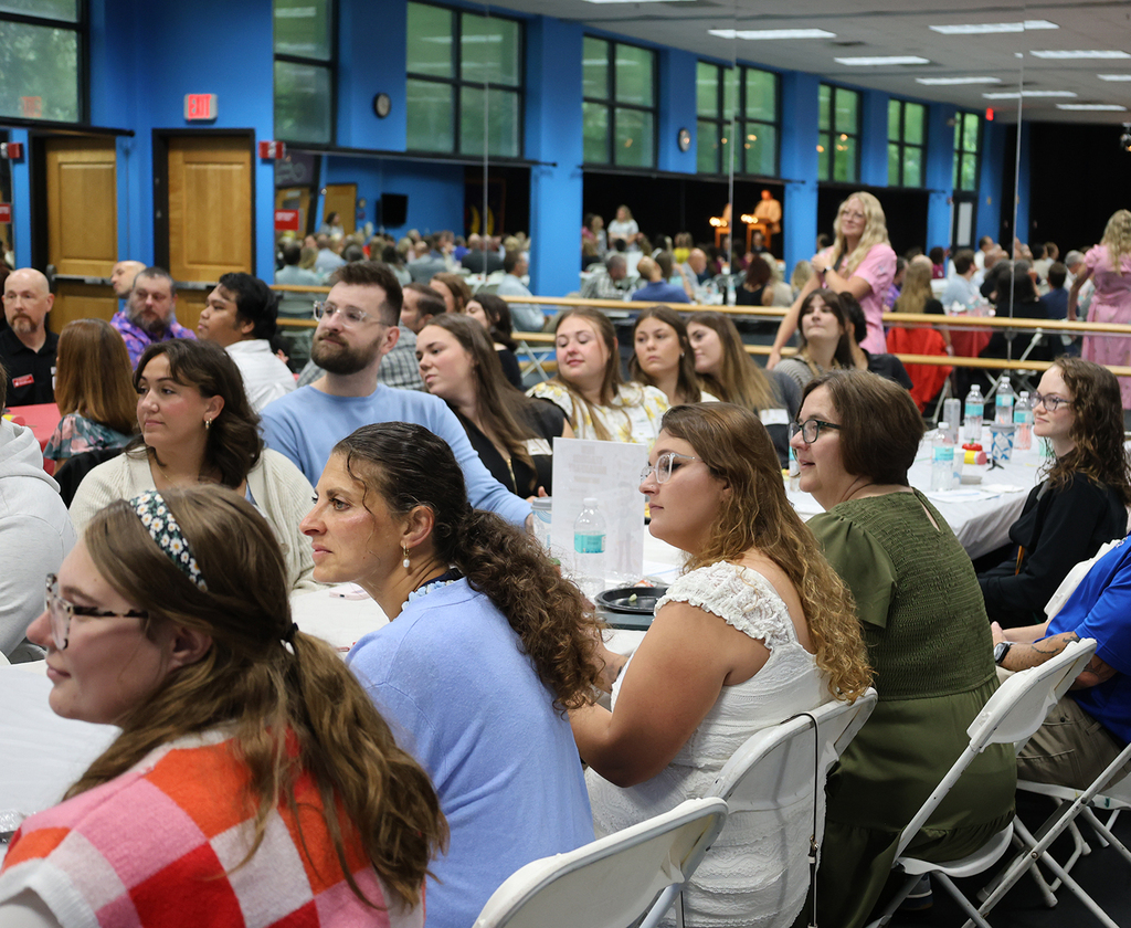 Teachers listening to the presentations