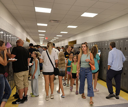 Families in the new classroom wing.