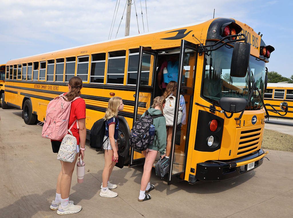 Students getting onto the bus