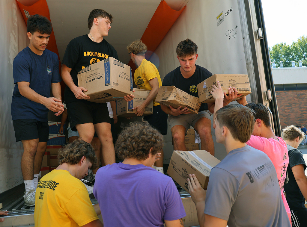 Students loading the trailer