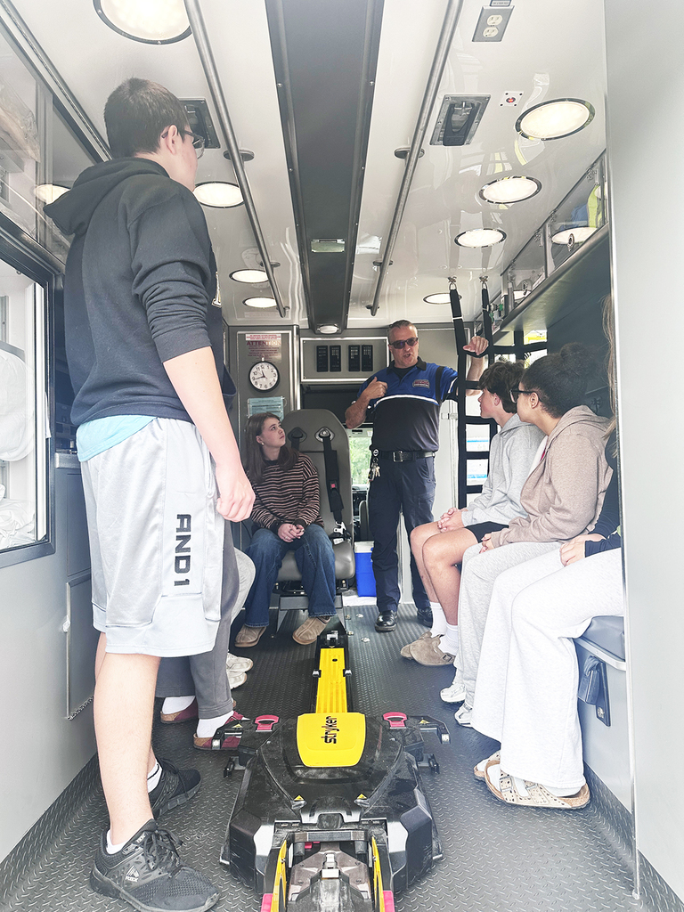 Jeremy visiting with students in the ambulance