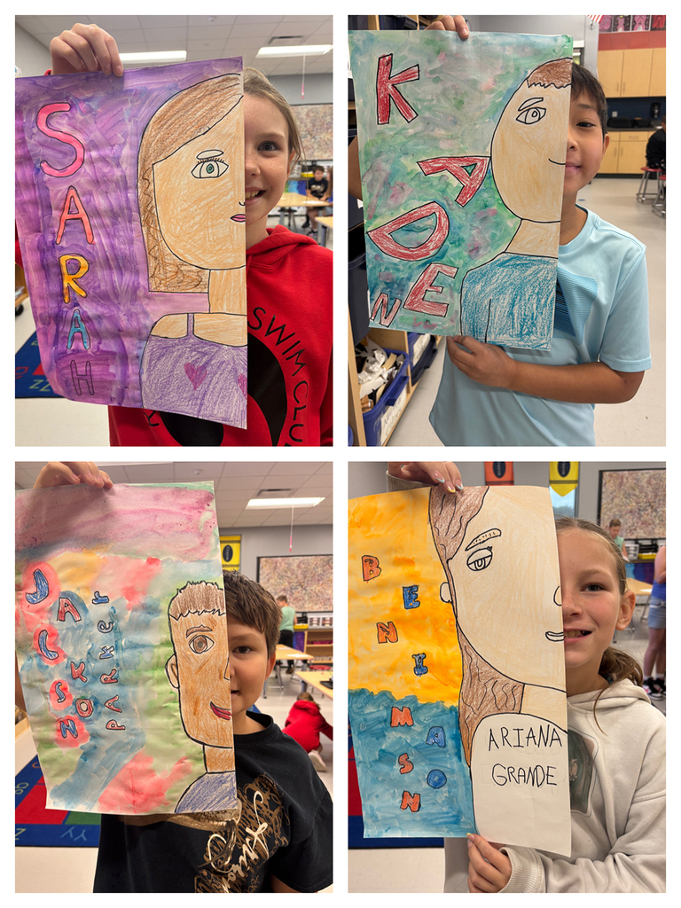 Students holding art work of half of their face with their namesin bubble letters next to the other half of their face