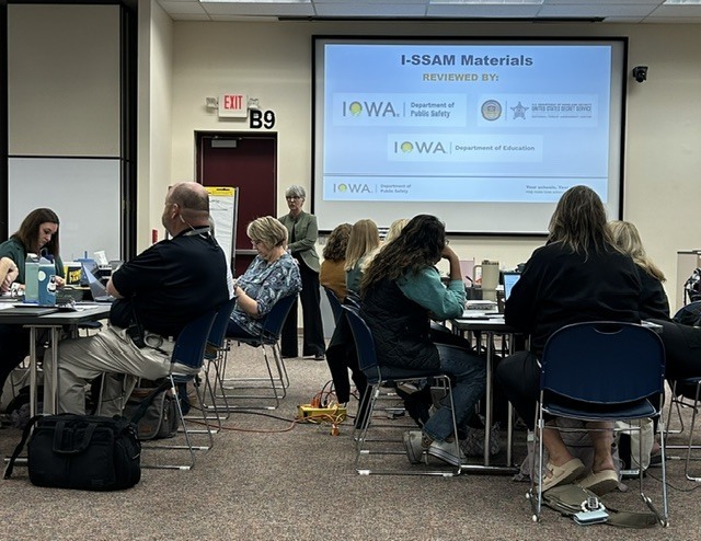 Picture of staff learning during the presentation