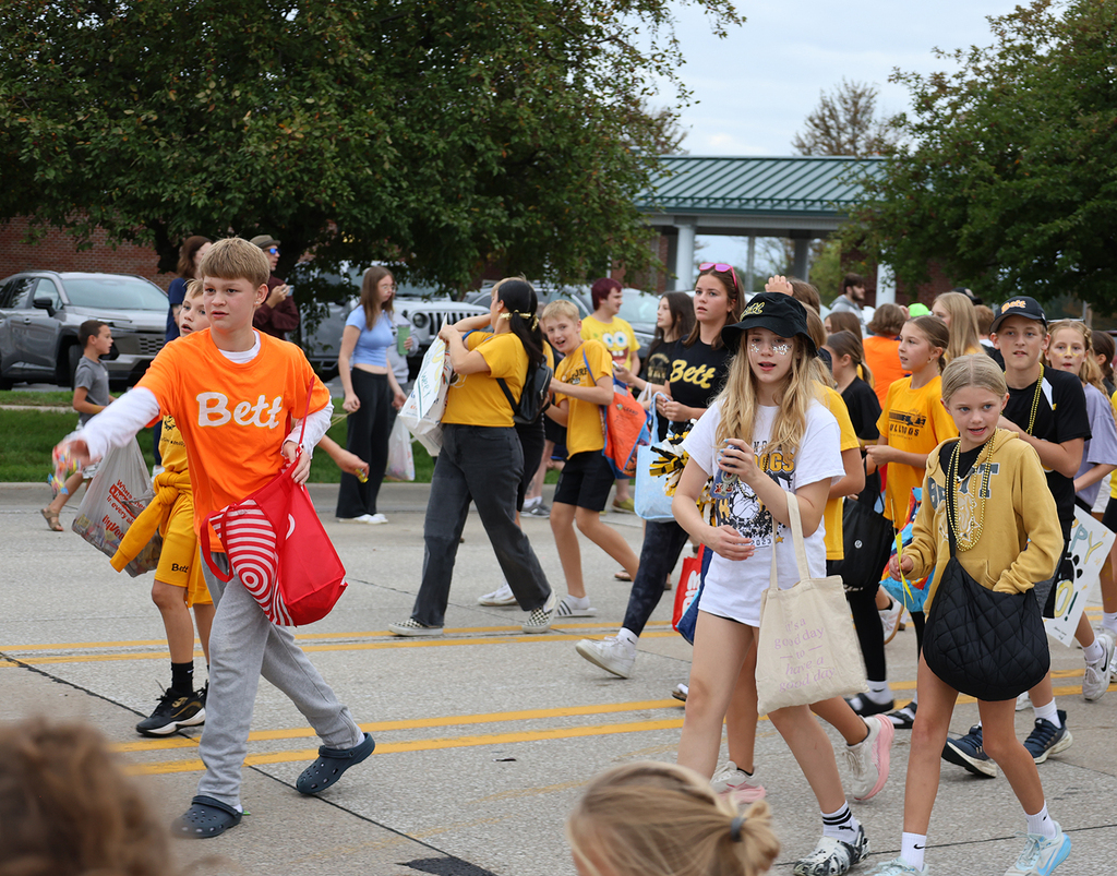 Bettendorf students in the parade throwing out candy