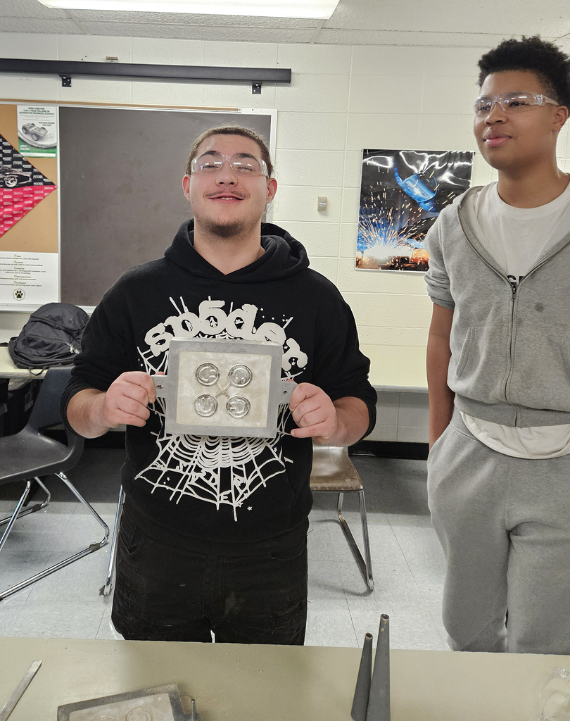 Student showing his casting of 4 smiley faces