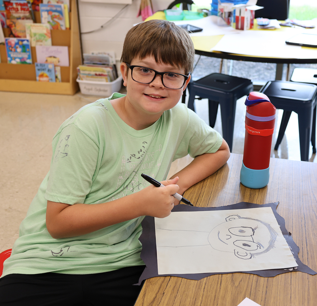 A boy with his portrait with big eyes and a smile