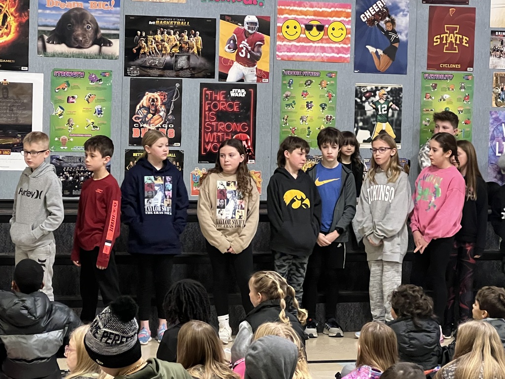 Student council presenting their check to Bett Outreach