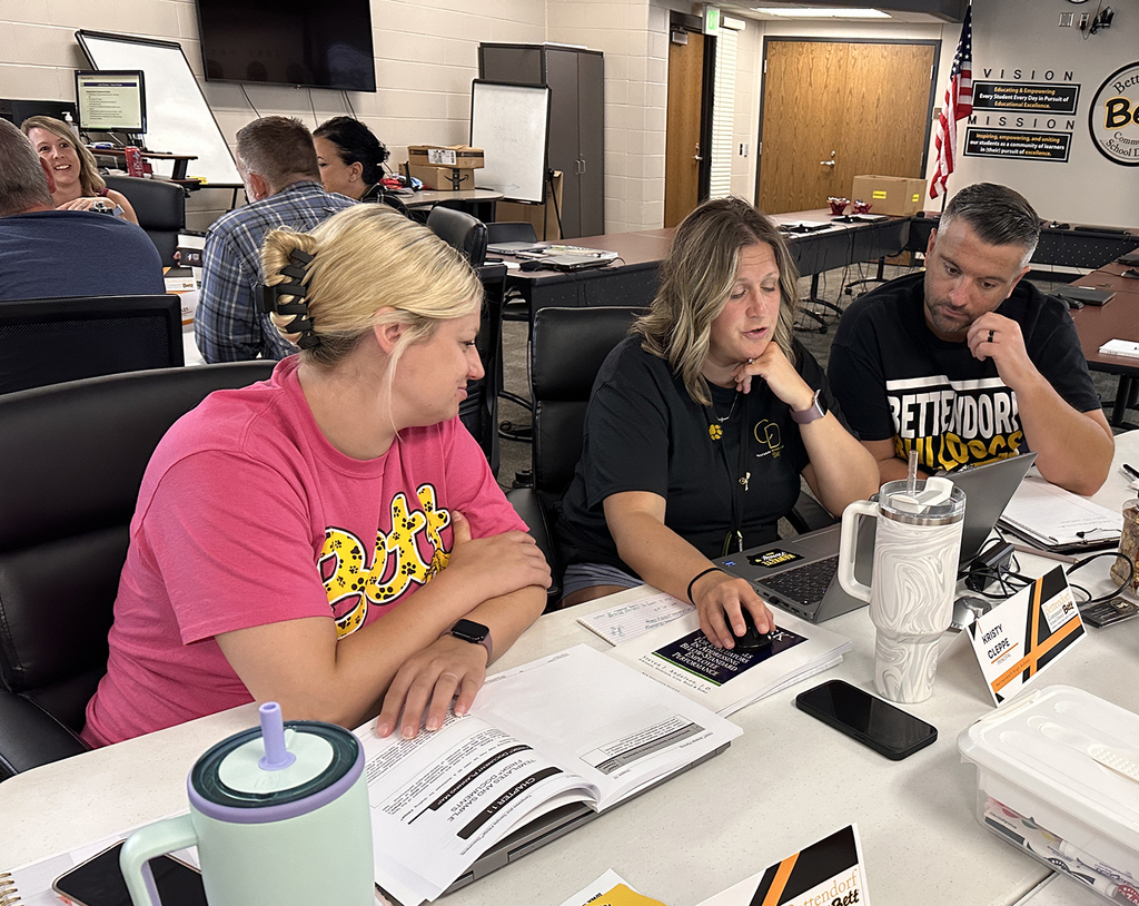 Heather Budd, Kristy Cleppe and Kevin Turner working together