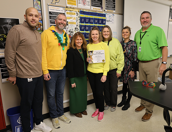 Katie Hansen with Dr Mores and the HS Admin Team