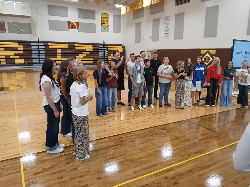 StuCo & cheerleaders pumping up to student body at our back to school assembly.