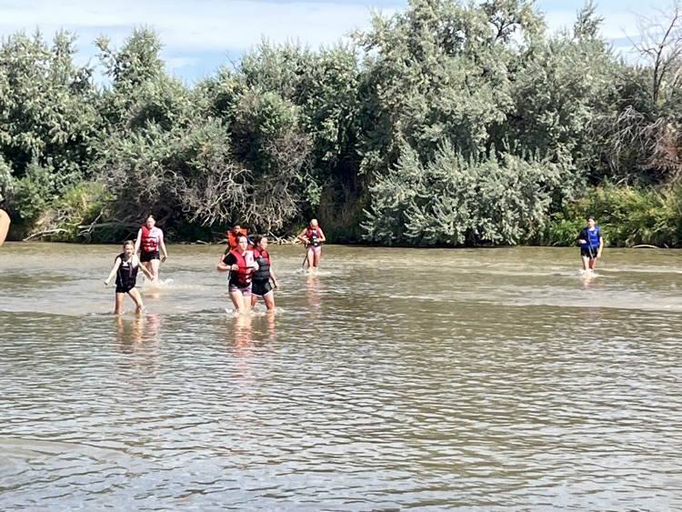 Enjoying swimming in the Bighorn River cooling off on a hot day!
