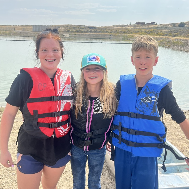 winners in 3rd heat of canoe races