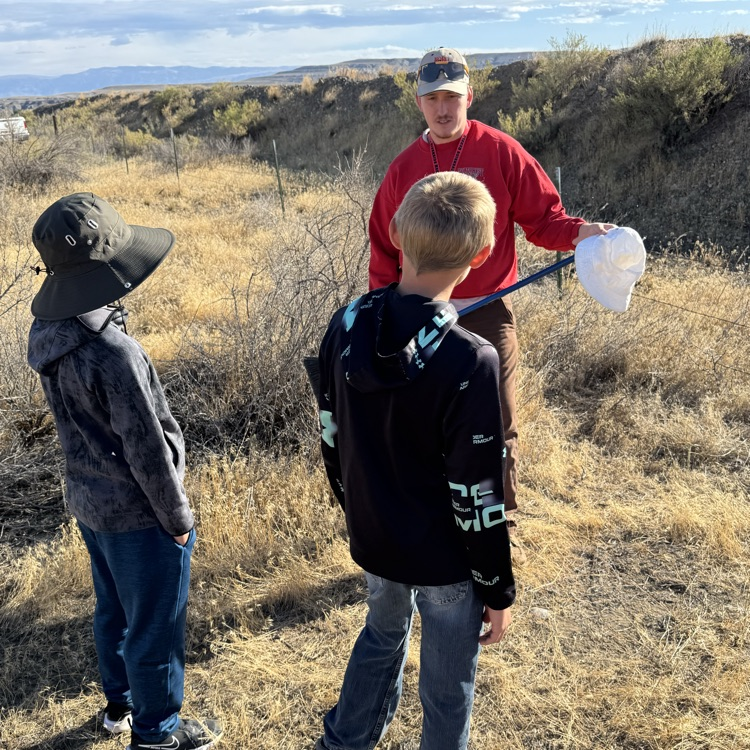 Learning how to cross a fence safely.