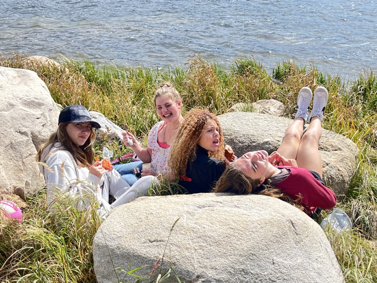 Eating their lunch laughing