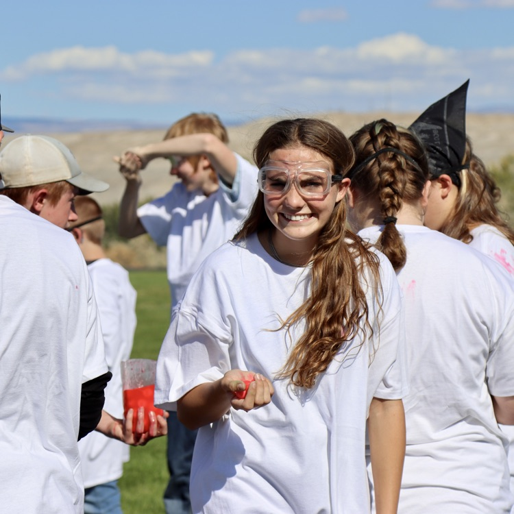 Middle school plays paint ball for their Homecoming field game