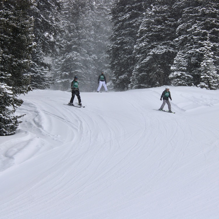 Our great skiers coming out of the trees!