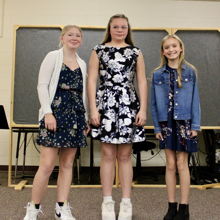 Kaislee, Mazi and Lena from the 6th grade sing together beautifully.
