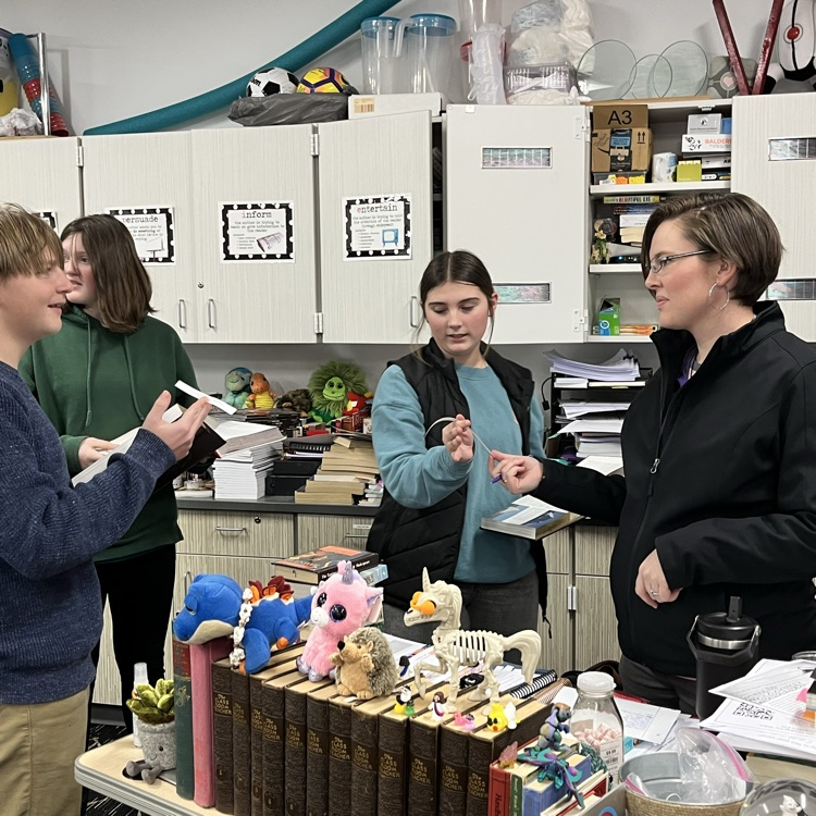 Bringing it to Mrs.Miller to prove they found it in books. 