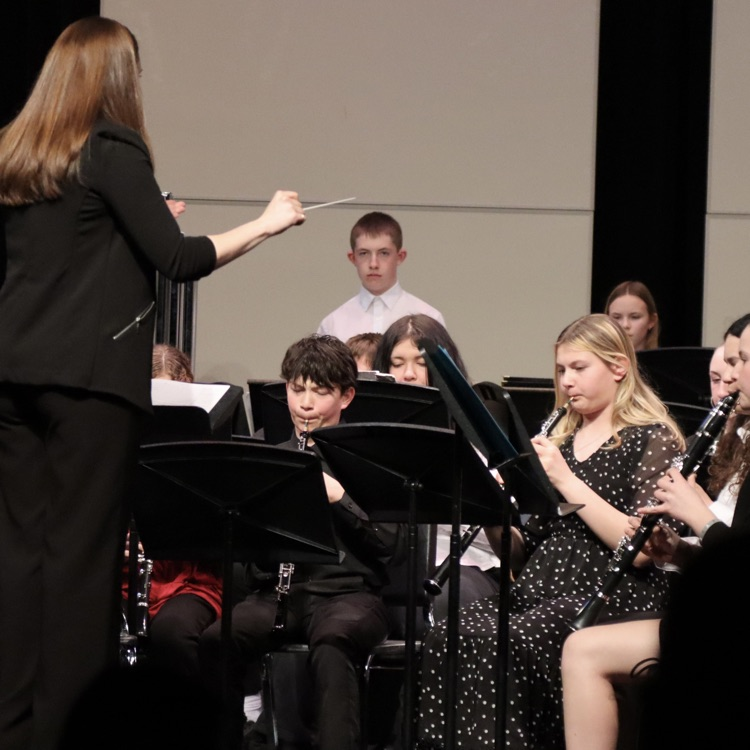 Brynn performs with the band.  
