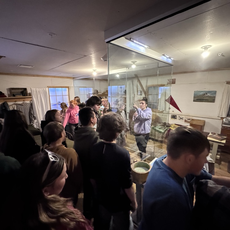 Being shown some artifacts from the camp.  