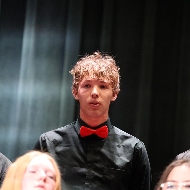 Paul singing with the choir  