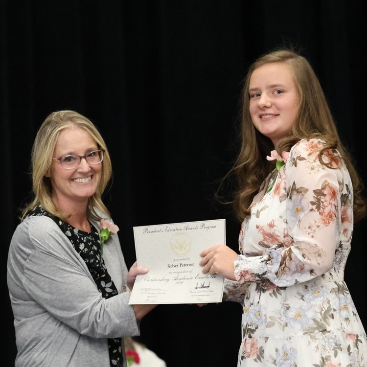 Kelsey receiving a special academic award  