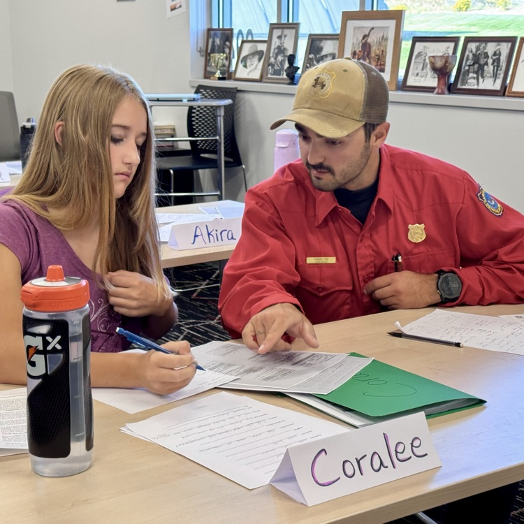 Our local game warden helping a student.  