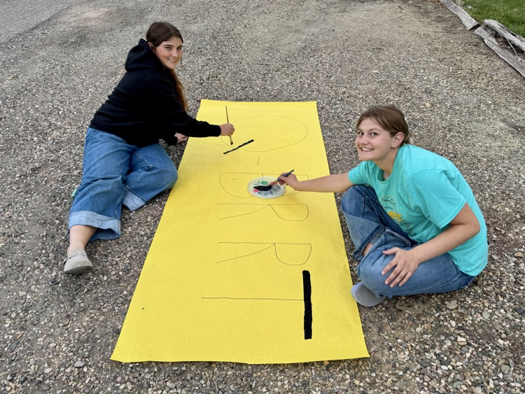 Painting the banners for the float.  