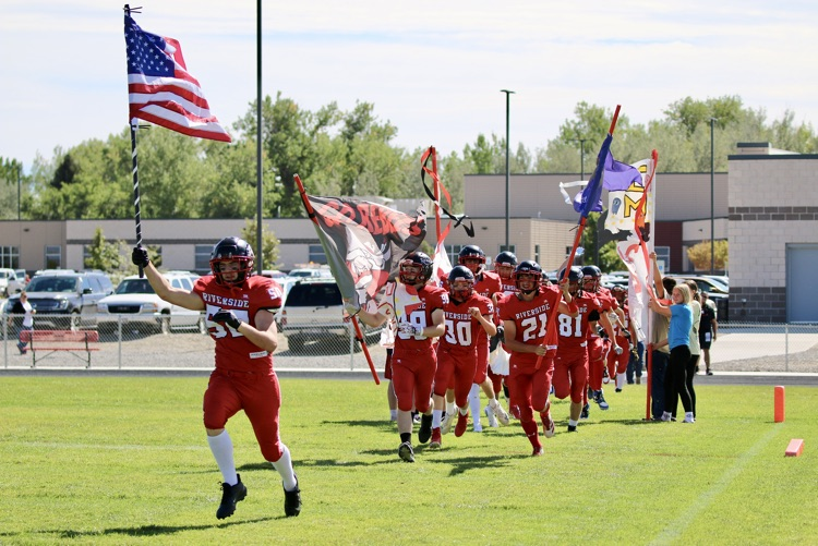 In comes the team to start the Homecoming game  