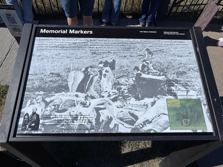 Learning about the memorial markers.  