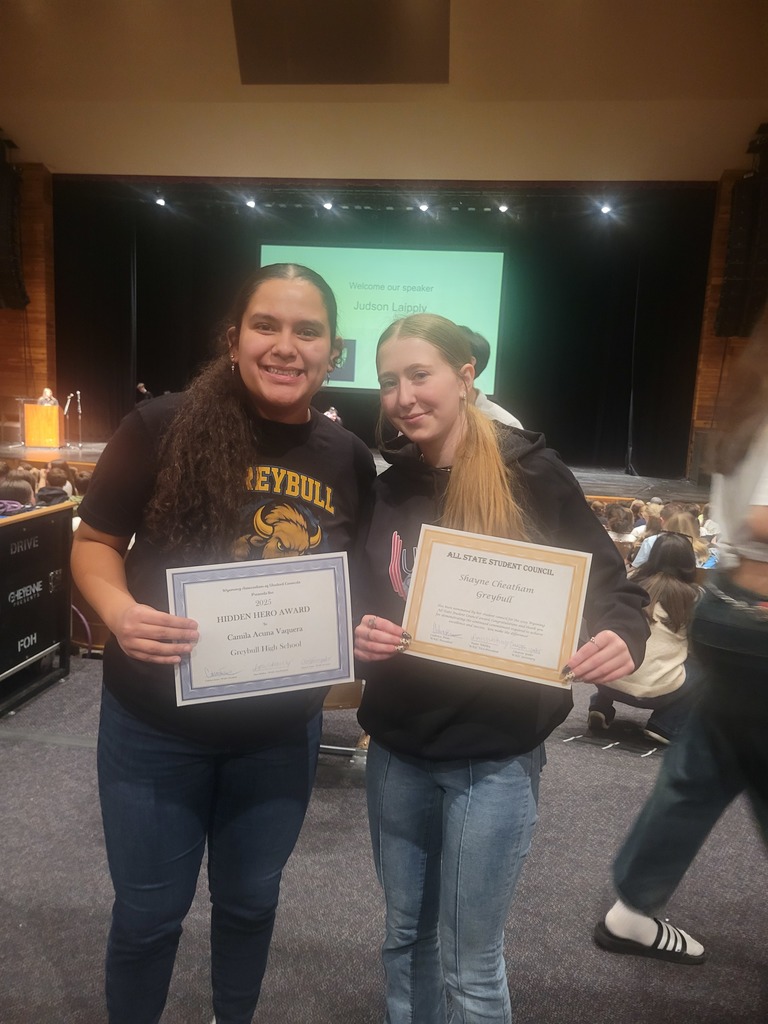 Camila Acuna and Shayne Cheatham with awards