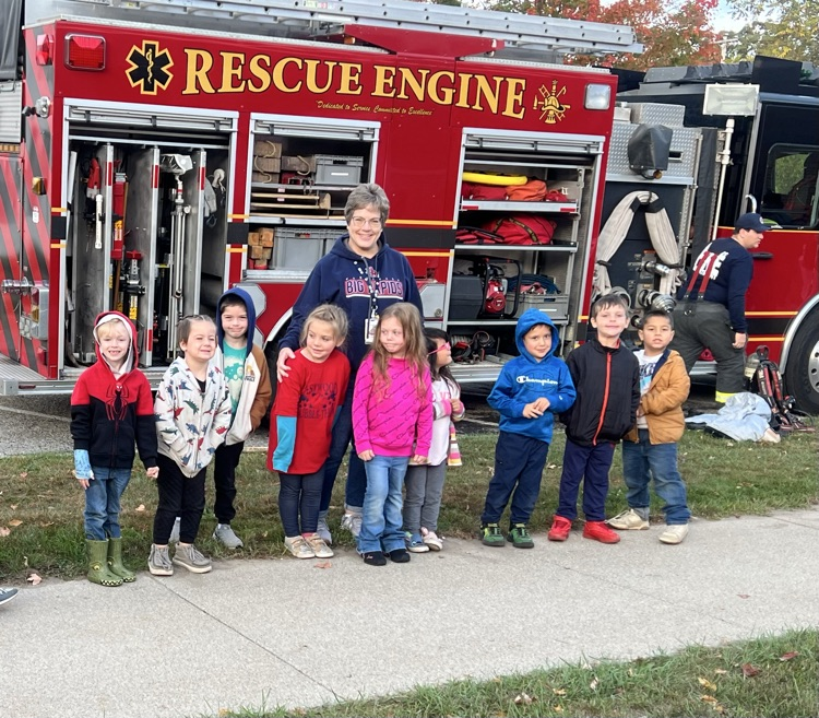 students with fire truck