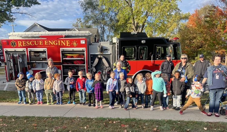 students with fire truck